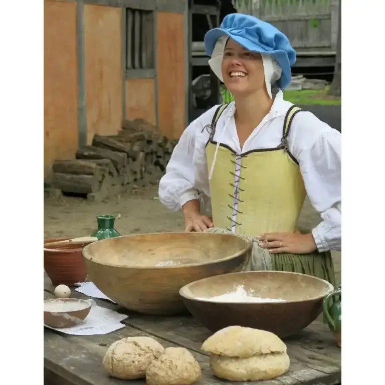 Andrea McEvoy baking 17th century bread at Jamestown Virginia