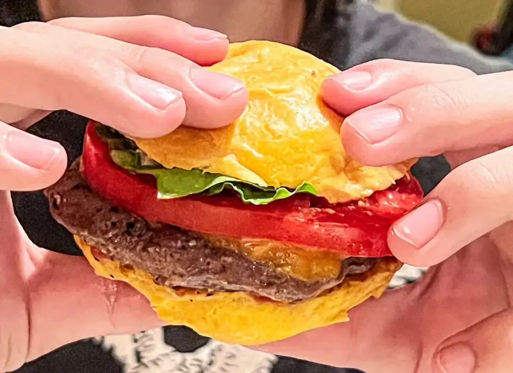 juicy cheeseburger with a sweet potato bun